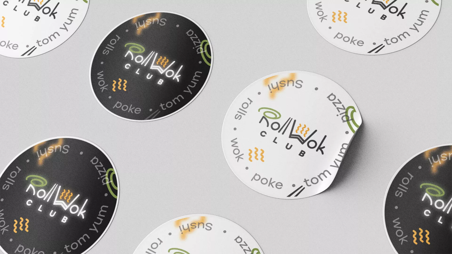 Разработка дизайна наклеек для суши-бара «Roll Wok Club» в Закаменске